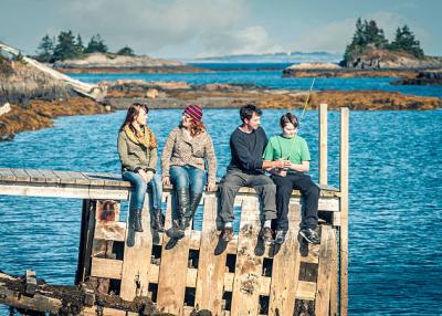 Friends relaxing on the pier.