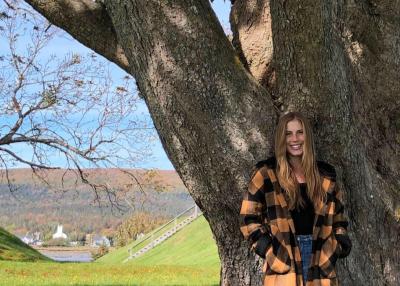 photo of Alyssa Gerhardt in front of a tree